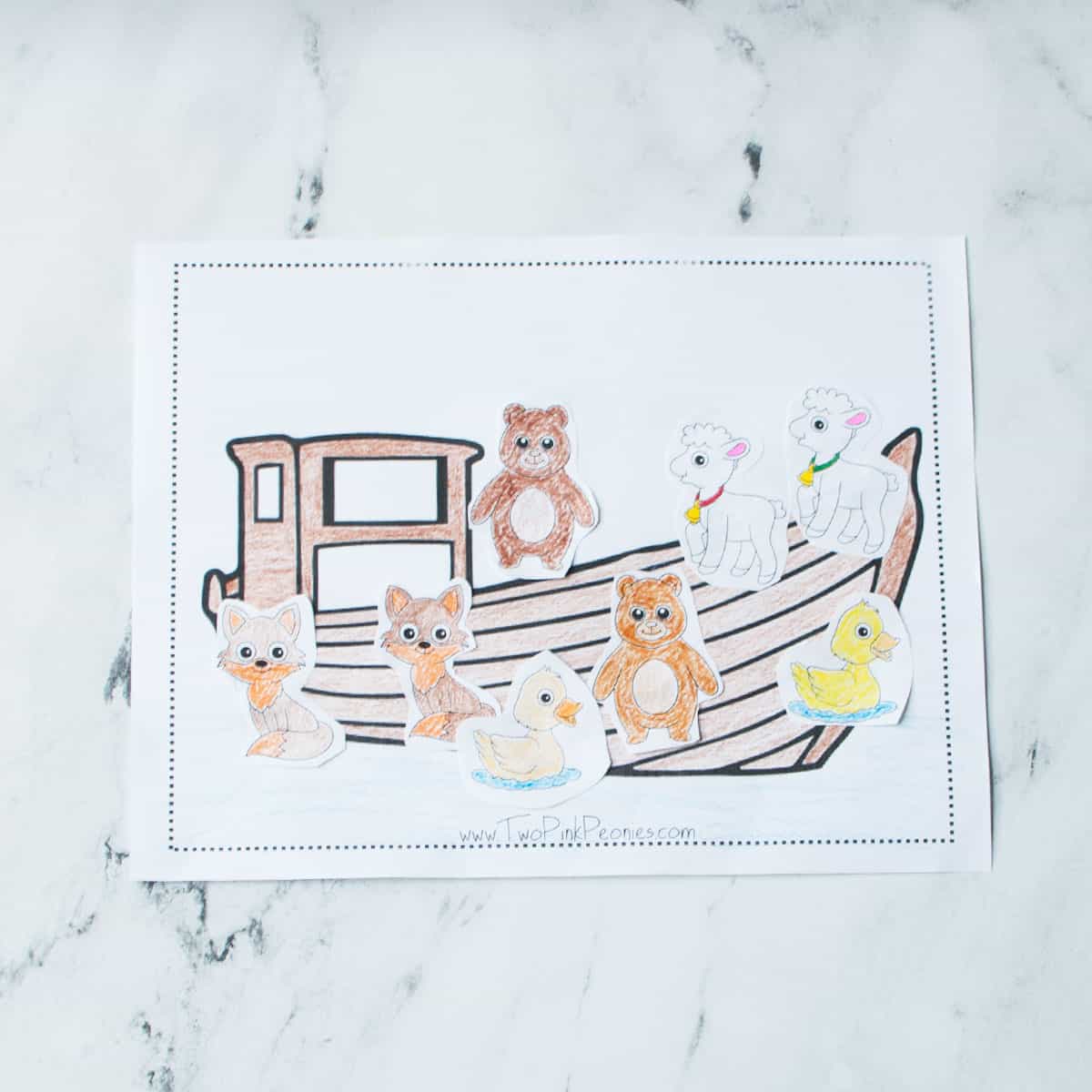 Noah's ark printable colored in with animals glued to it