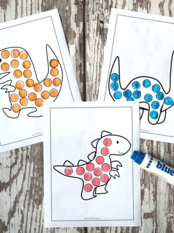 dinosaur dot marker pages with a blue dot marker