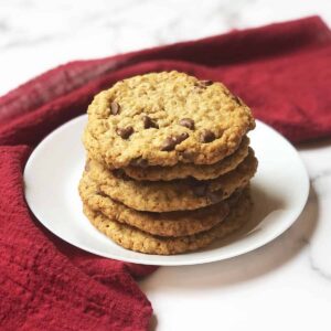 copycat potbelly oatmeal chocolate chip cookies stacked up on a plate