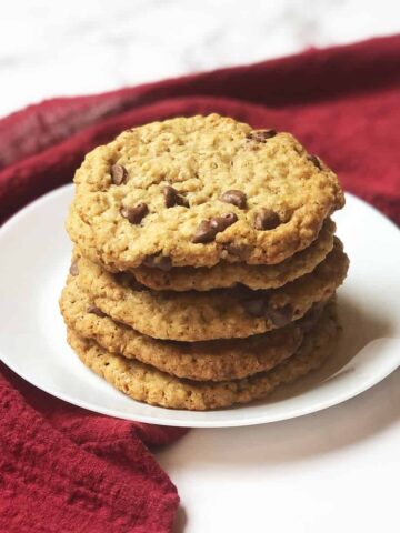 copycat potbelly oatmeal chocolate chip cookies stacked up on a plate