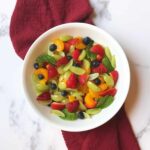 dairy free fruit salad in a white bowl