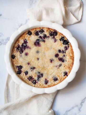Blueberry Pie Baked Oatmeal with a white linen
