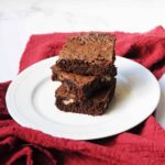 Copycat Thunder from Down Under Brownies stacked on a white plate