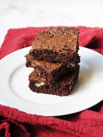 Copycat Thunder from Down Under Brownies stacked on a white plate