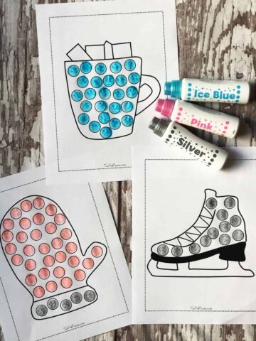 picture of three winter do a dot sheets (mug, mitten, and ice skate) and 3 dot markers