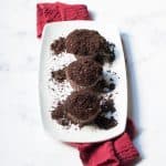 Oreo Crunch Cupcakes with a red linen