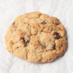An up close photo of a sourdough chocolate chip cookie.