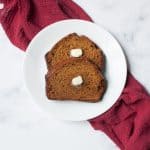 Copycat Bob Evans Pumpkin Bread sliced with butter on it