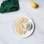 Copycat Chicken Salad Chick Lemon Basil in a white bowl surrounded by crackers
