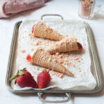 Strawberry Crunch Cheesecake Cones on a silver tray