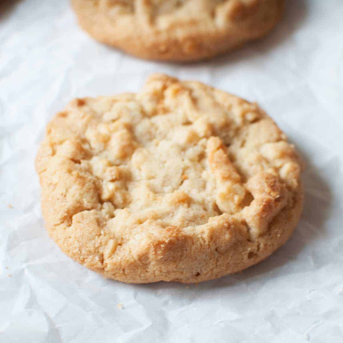 Copycat Subway White Chocolate Macadamia Nut Cookie on parchment paper. 