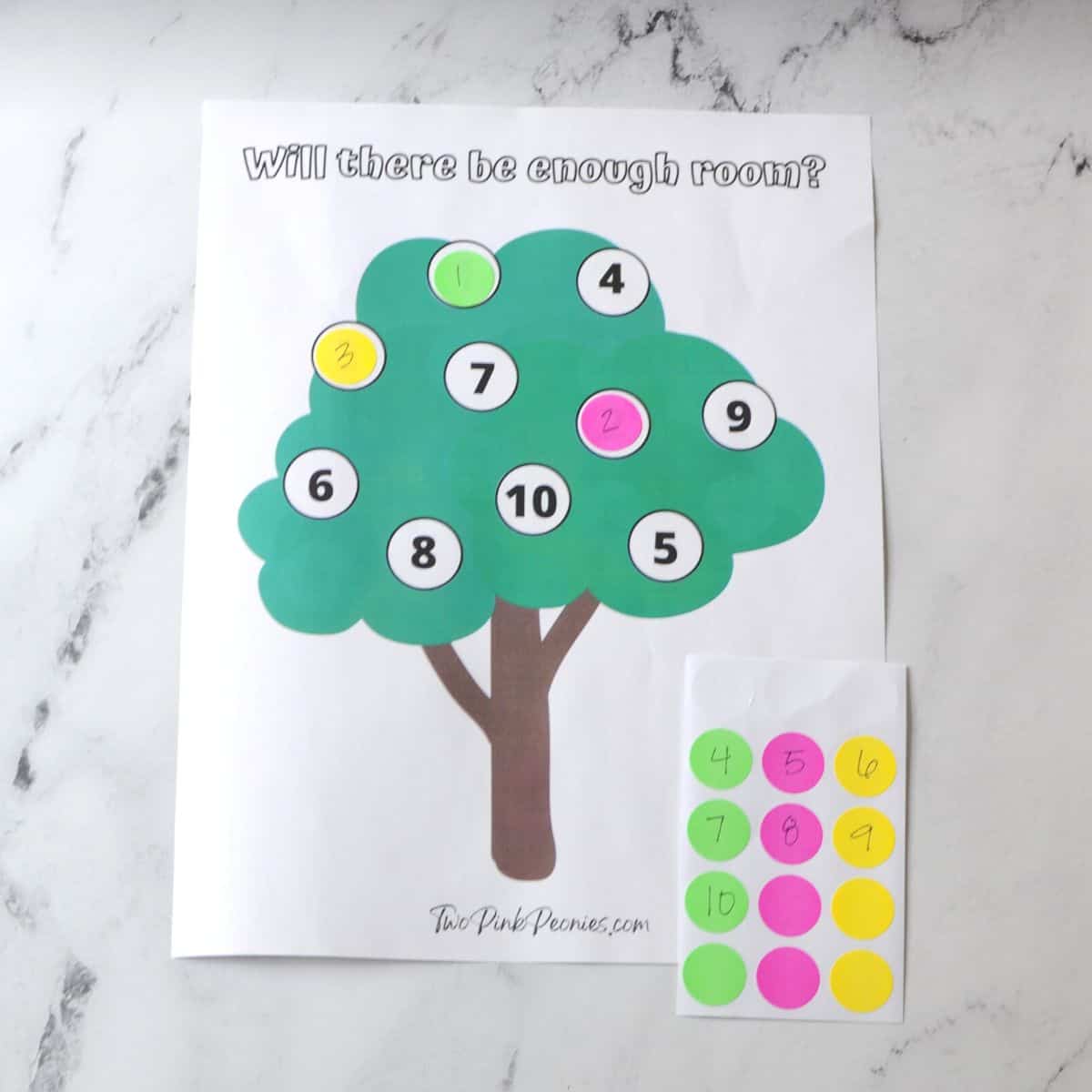 a printable (a tree with numbers on it) and dot stickers