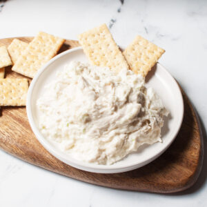 Copycat Chicken Salad Chick Dixie Chick in a white bowl with crackers