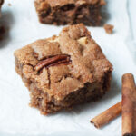 whole wheat apple coffee cake slice with cinnamon sticks