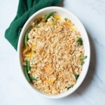 roasted vegetable casserole with a green tea towel