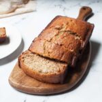 banana bread with shortening on a wooden tray