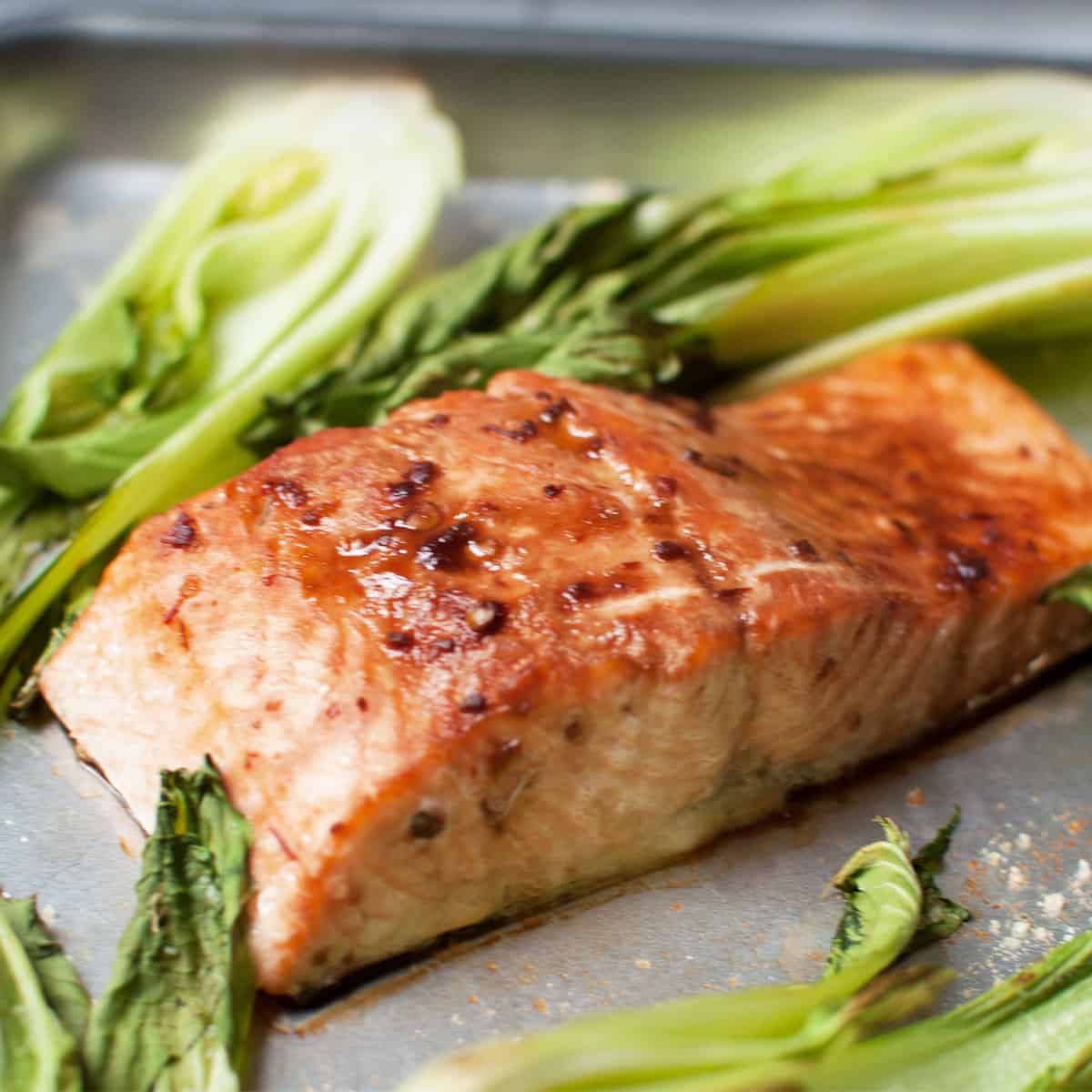 salmon and bok choy on a sheet pan