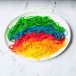 spaghetti noodles that have been dyed rainbow colors
