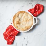 apple pie with a red and white linen
