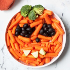 veggie tray shaped like a pumpkin face