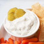 dill pickle ranch with pickle slices in it