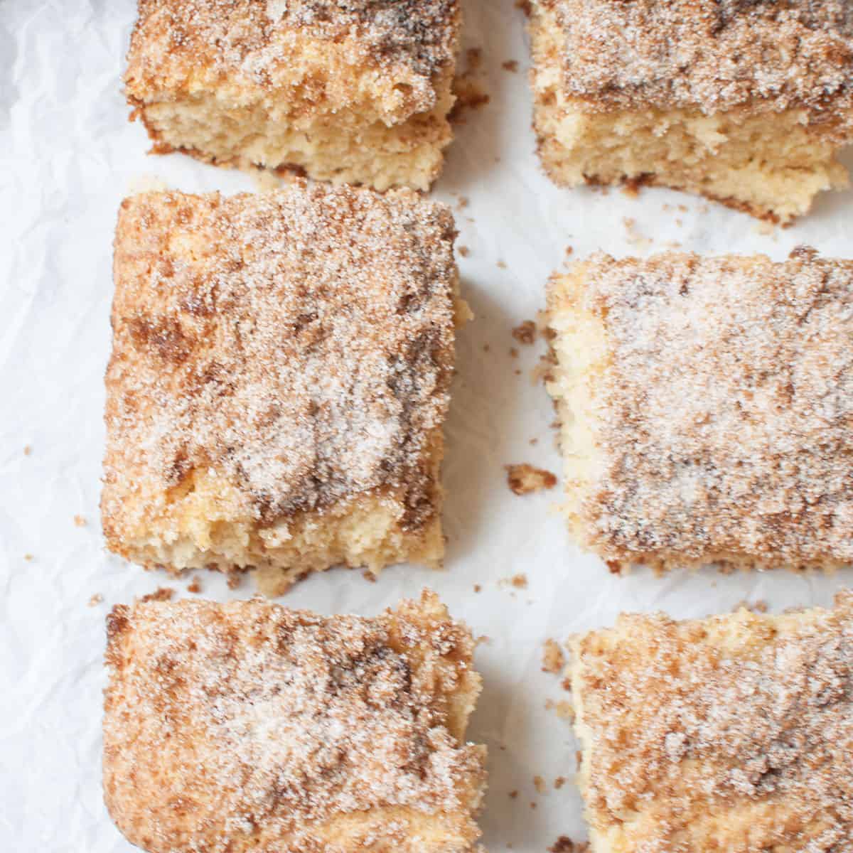 Amish Coffee Cake slices on parchment paper. 