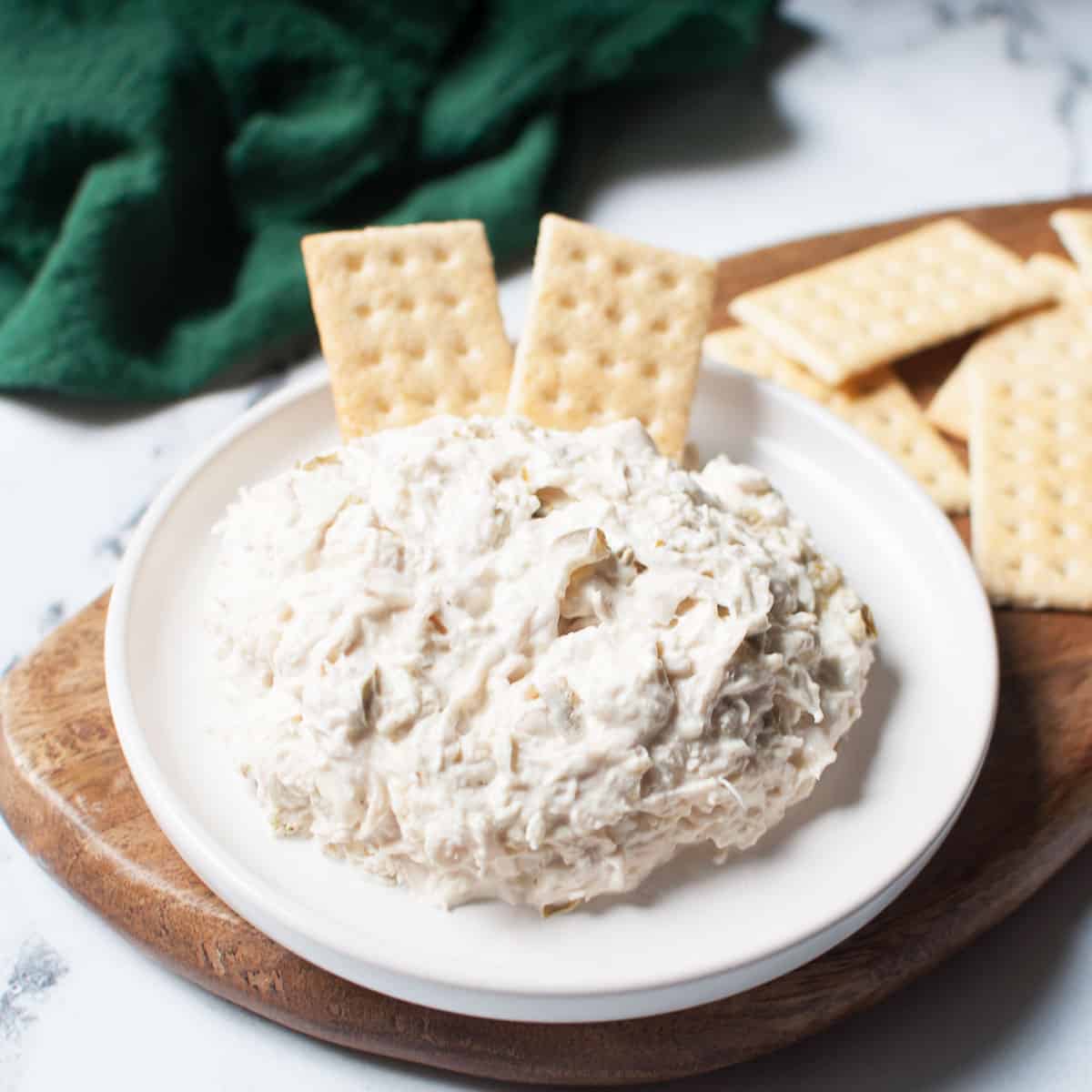 Copycat Chicken Salad Chick Jalapeno Holly chicken salad on a plate with crackers
