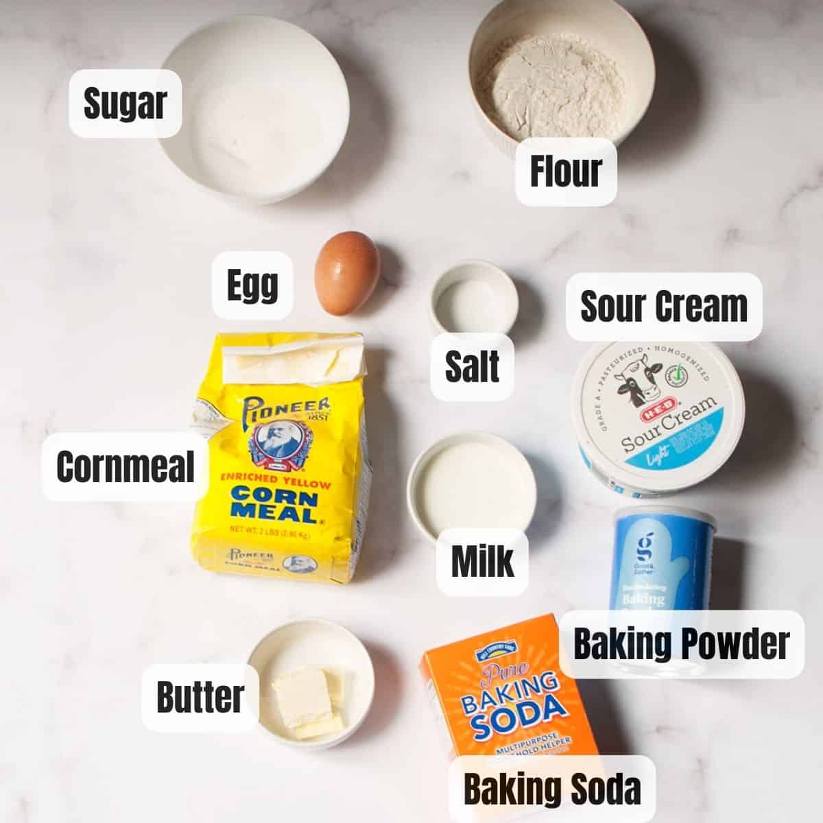 The ingredients needed to make Jumbo corn muffins. Each ingredient is labeled.