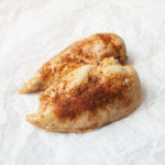 Instant pot blackened chicken on a white background.