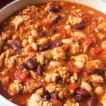 V8 Turkey Chili in a white bowl.