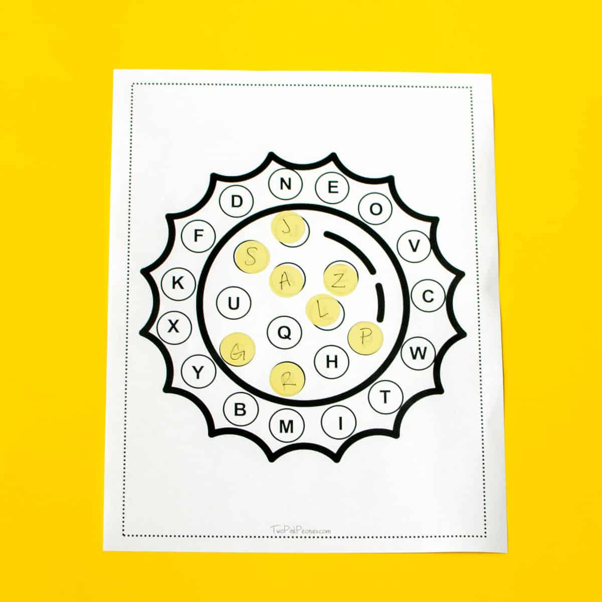 Summer alphabet match printable on a yellow background.