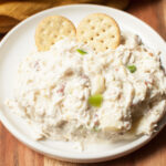 Copycat Chicken Salad Chick Maui Mama chicken salad on a plate with crackers.