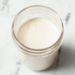 Copycat Texas Roadhouse Caesar dressing in a mason jar.