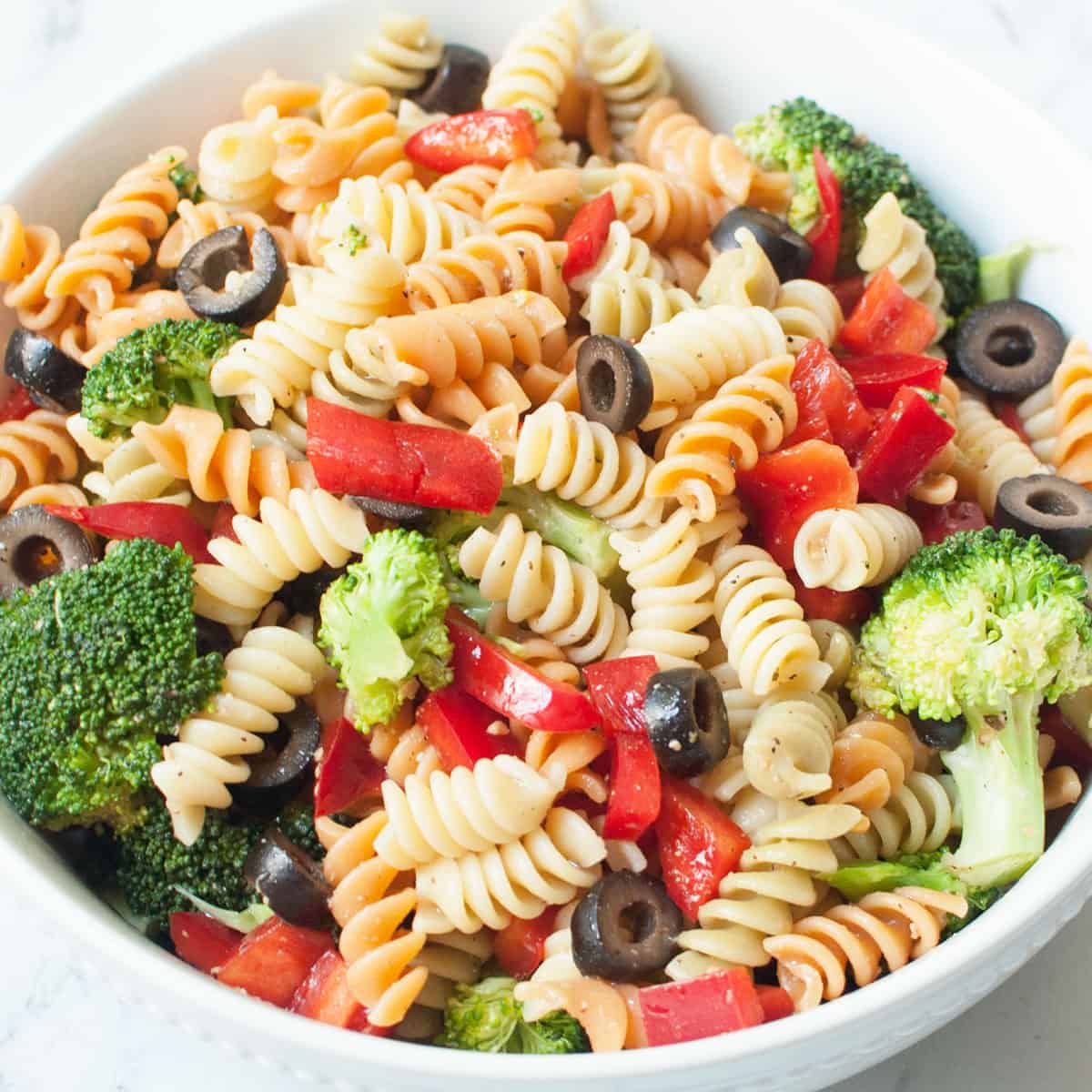Copycat Jason's Deli Pasta Salad in a white bowl.