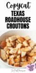 Text that says, "Copycat Texas Roadhouse Croutons" with a photograph of croutons in a white bowl beneath the text.